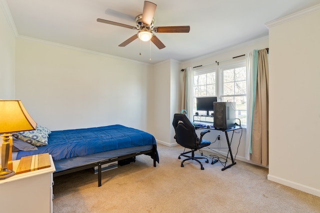 bedroom featuring crown molding, light carpet, and ceiling fan