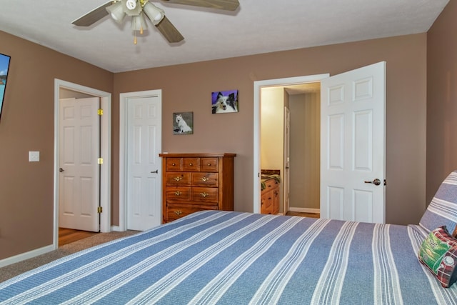 unfurnished bedroom with ceiling fan and carpet floors