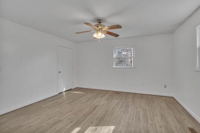 unfurnished room featuring ceiling fan and light hardwood / wood-style flooring