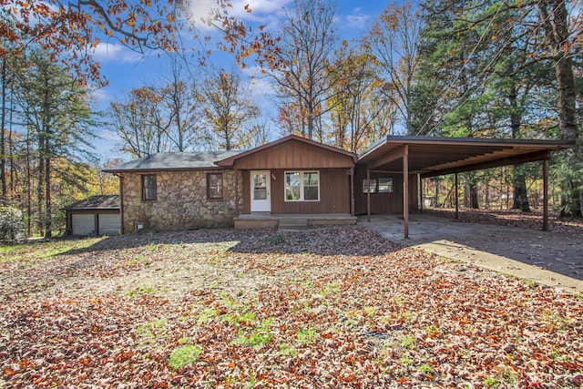 view of front of home with a carport