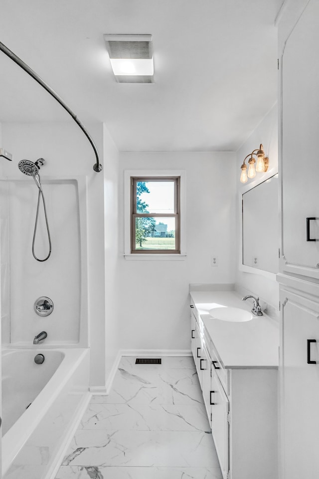 bathroom featuring vanity and bathtub / shower combination