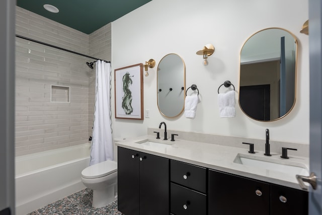 full bathroom featuring vanity, toilet, and shower / bathtub combination with curtain