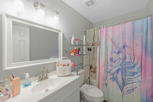 full bathroom with vanity, toilet, a textured ceiling, and shower / tub combo