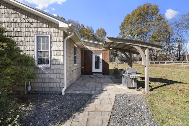 view of patio with a grill