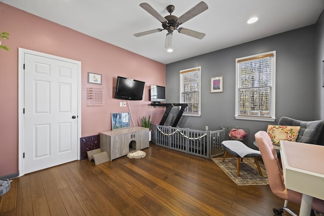 bedroom featuring ceiling fan and dark hardwood / wood-style flooring