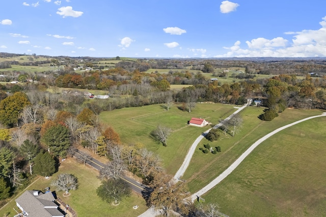 birds eye view of property featuring a rural view