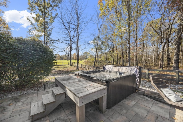 view of patio / terrace featuring a hot tub