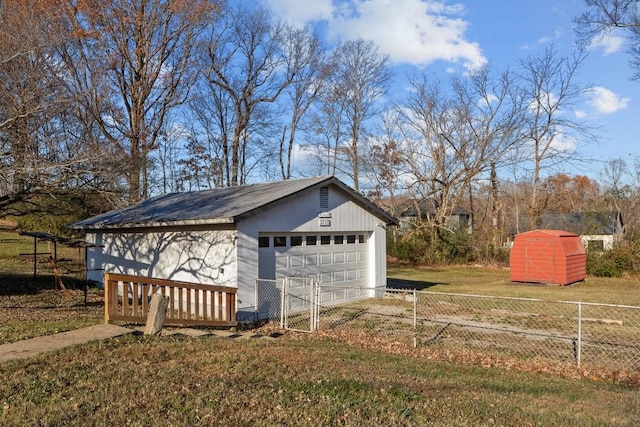 garage with a yard