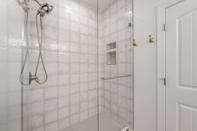 bathroom with an enclosed shower