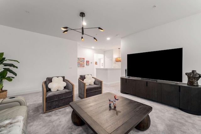 living room with light carpet and a chandelier