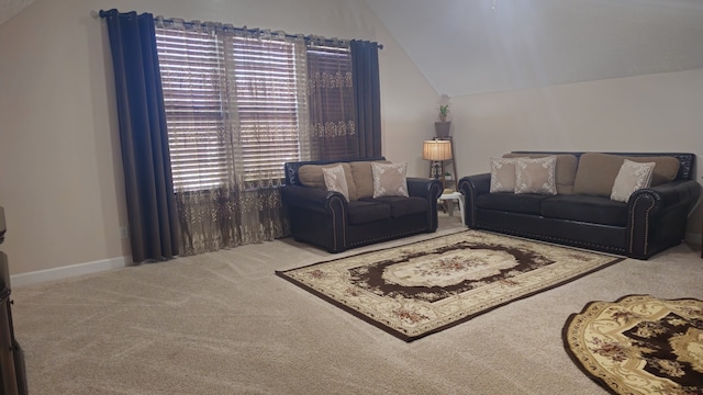 living room with carpet and lofted ceiling