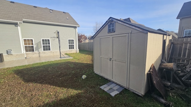 view of outdoor structure with a lawn