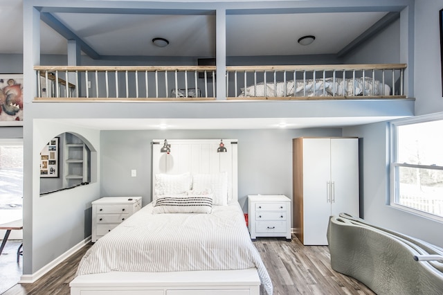 bedroom with wood-type flooring