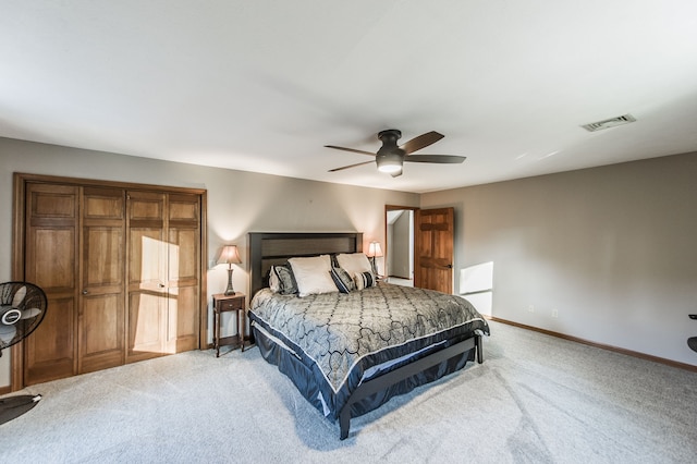 carpeted bedroom featuring ceiling fan