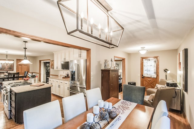 dining room featuring light wood-type flooring