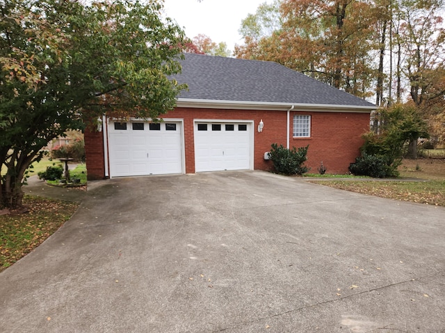 view of property exterior featuring a garage