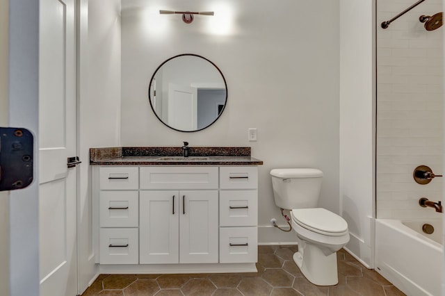 full bathroom with toilet, vanity, tile patterned floors, and tiled shower / bath