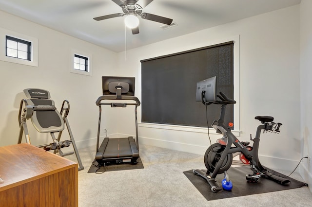 exercise room featuring carpet and ceiling fan