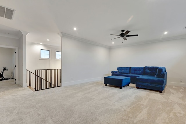 sitting room featuring light colored carpet and ornamental molding