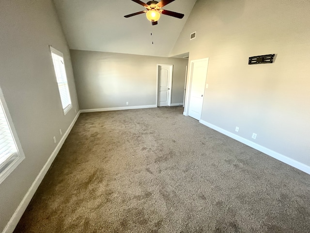 unfurnished bedroom featuring carpet flooring, ceiling fan, and high vaulted ceiling