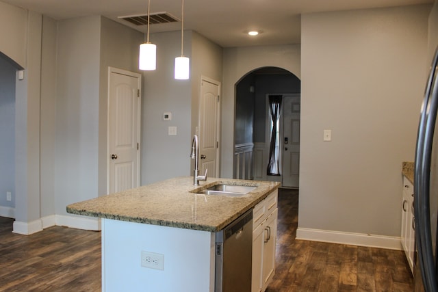 kitchen featuring white cabinetry, sink, stainless steel dishwasher, an island with sink, and pendant lighting