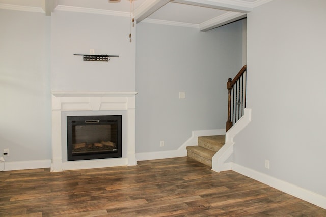 unfurnished living room with ornamental molding and dark wood-type flooring