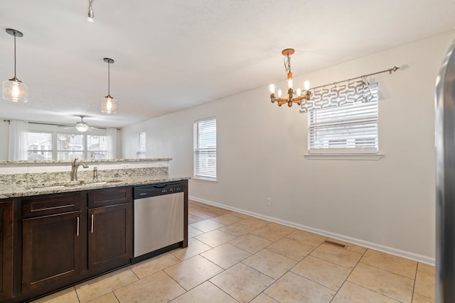 kitchen with dishwasher, pendant lighting, a wealth of natural light, and sink