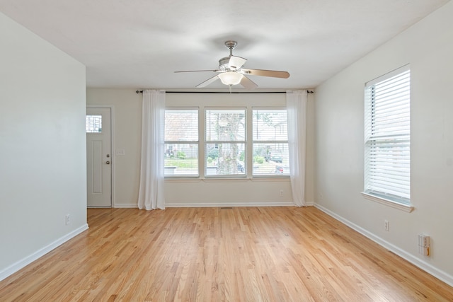 interior space featuring light hardwood / wood-style floors, plenty of natural light, and ceiling fan