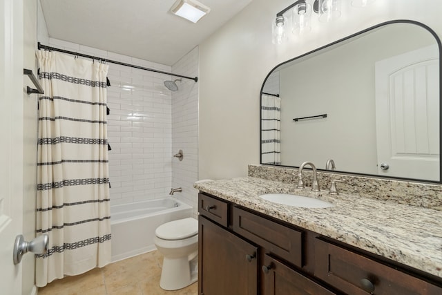 full bathroom featuring tile patterned flooring, shower / bath combo, vanity, and toilet