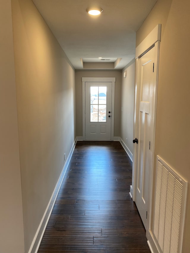 doorway to outside featuring dark hardwood / wood-style floors