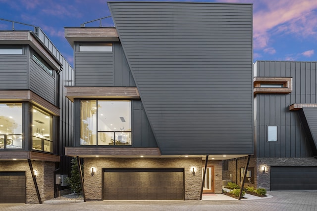 view of front of property with a garage