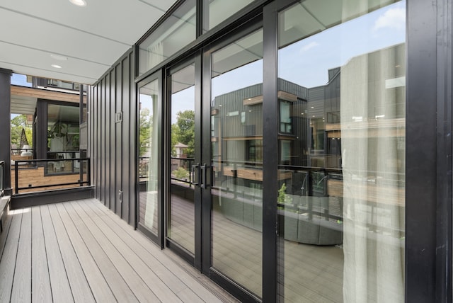 exterior space featuring hardwood / wood-style flooring and plenty of natural light