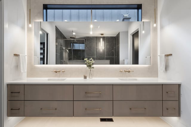 bathroom with vanity and walk in shower