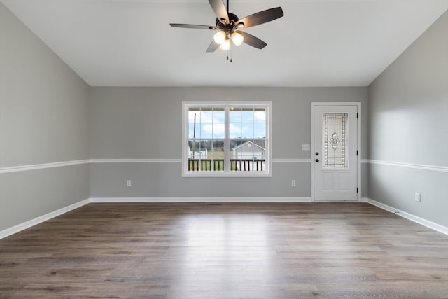 entrance foyer with hardwood / wood-style flooring and ceiling fan