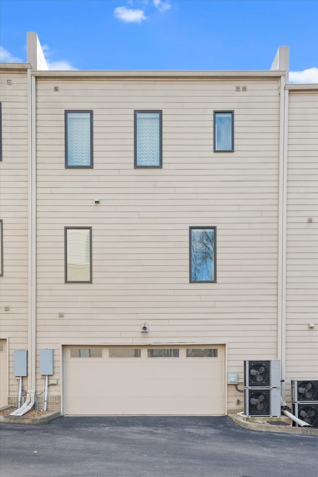 exterior space featuring a garage