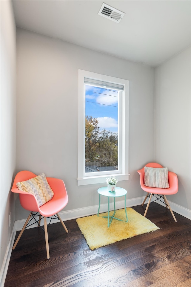 sitting room featuring hardwood / wood-style flooring