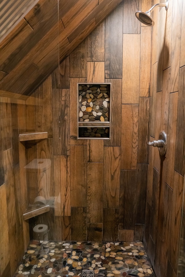 details featuring wood walls and a shower