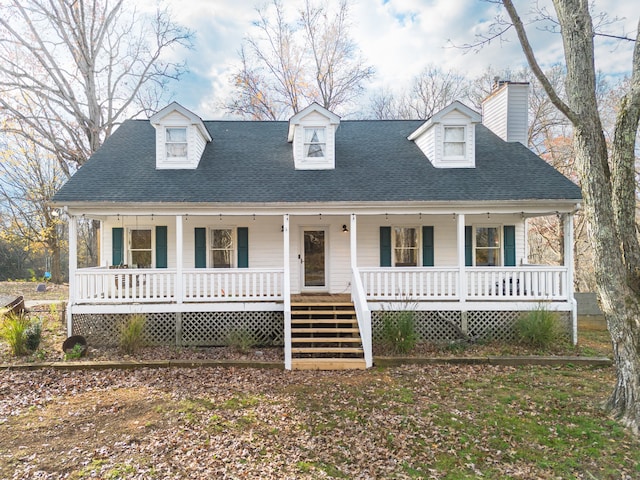 cape cod house with covered porch