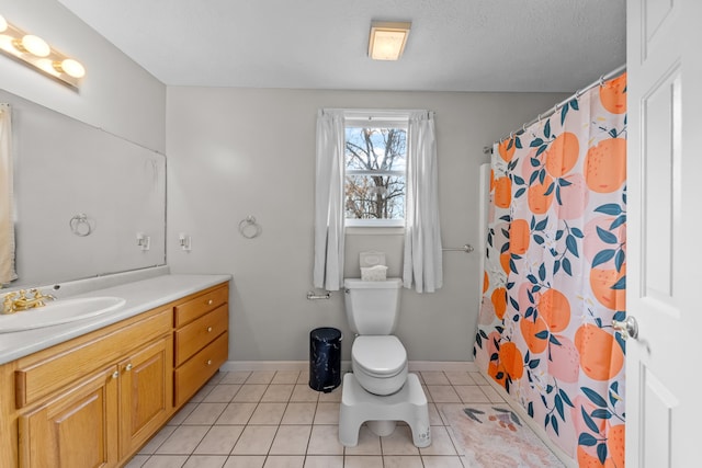 bathroom with vanity, tile patterned flooring, toilet, a textured ceiling, and curtained shower