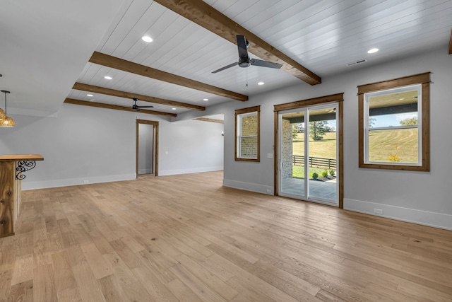 unfurnished living room with beamed ceiling, light hardwood / wood-style flooring, ceiling fan, and wood ceiling