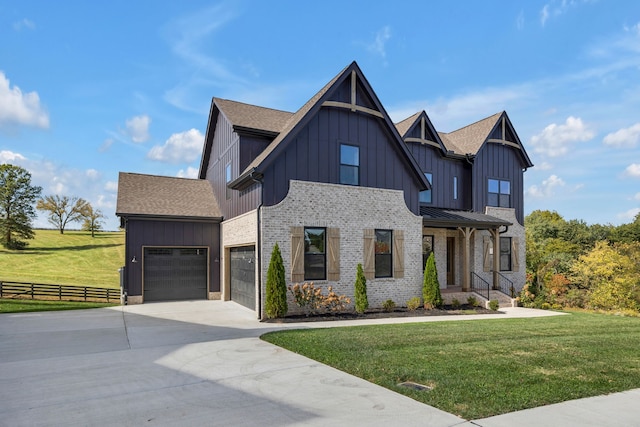 view of front facade with a front lawn and a porch