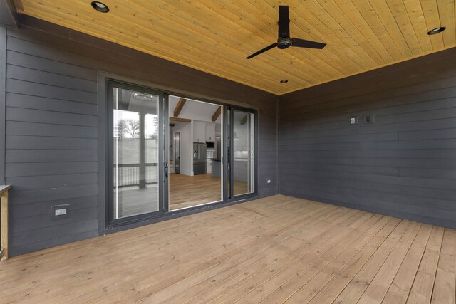 wooden deck with ceiling fan