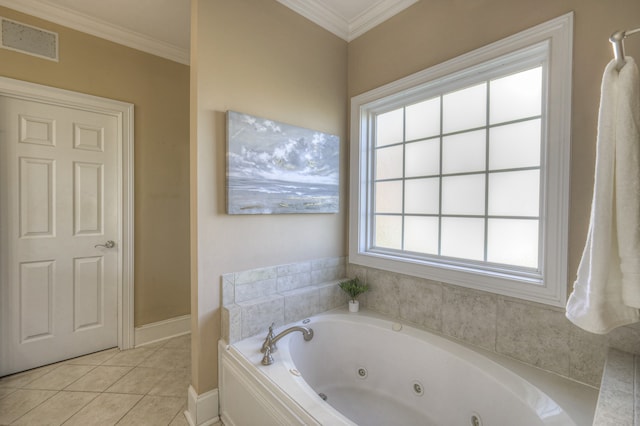 bathroom featuring tile patterned floors, crown molding, and tiled tub