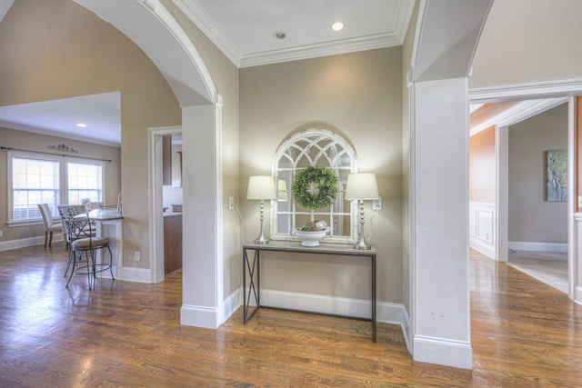 hall featuring crown molding and dark hardwood / wood-style flooring