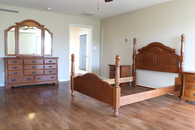 bedroom featuring hardwood / wood-style flooring and ceiling fan