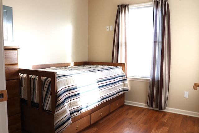 unfurnished bedroom featuring dark hardwood / wood-style floors