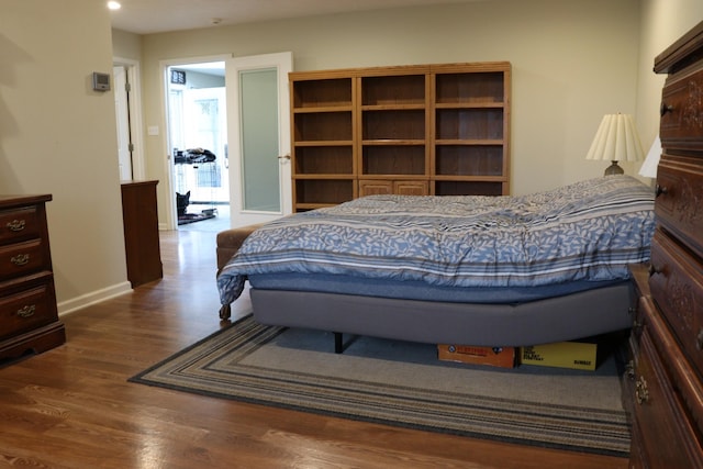 bedroom featuring hardwood / wood-style flooring