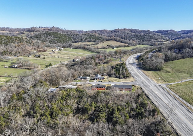 aerial view with a mountain view and a rural view