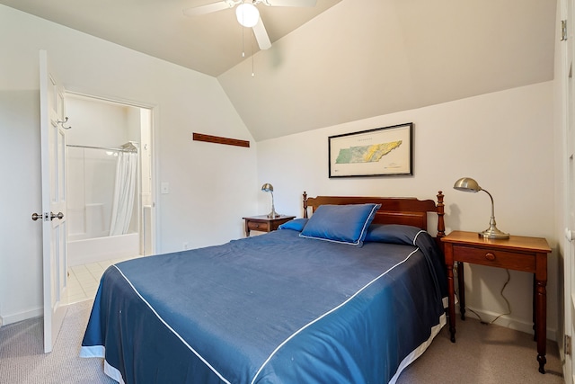 carpeted bedroom featuring ceiling fan and vaulted ceiling