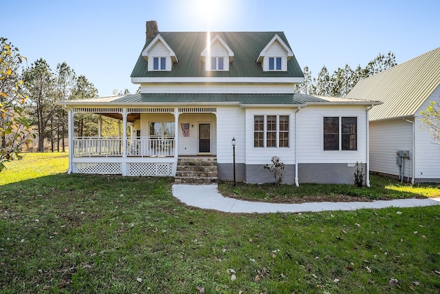 farmhouse-style home with covered porch and a front lawn